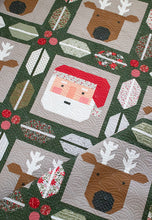 Load image into Gallery viewer, Christmas Crew - a holiday quilt featuring Santa and his reindeer framed in berry and pine sashing. Make it with a Jelly Roll or Layer Cake. Fabric is Berry & Pine by Lella Boutique for Moda Fabrics. Download the PDF here!