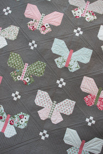Flutter simple butterfly quilt pattern by Lella Boutique. Cute simple butterfly block made using fat eighths. Fabric is Lovestruck by Lella Boutique for Moda Fabrics. Download the PDF here.