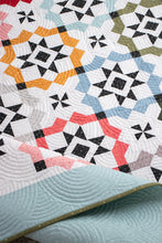 Load image into Gallery viewer, Glam Squad overlapping star tile quilt by Vanessa Goertzen of Lella Boutique. Fabric is Magic Dot by Lella Boutique for Moda Fabrics (October 2024). Make it with a dessert roll or fat eighths! Download the PDF pattern here.