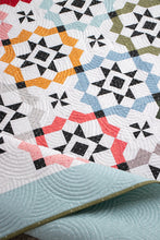 Load image into Gallery viewer, Glam Squad overlapping star tile quilt by Vanessa Goertzen of Lella Boutique. Fabric is Magic Dot by Lella Boutique for Moda Fabrics (October 2024). Make it with a dessert roll or fat eighths!