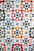 Load image into Gallery viewer, Glam Squad overlapping star tile quilt by Vanessa Goertzen of Lella Boutique. Fabric is Magic Dot by Lella Boutique for Moda Fabrics (October 2024). Make it with a dessert roll or fat eighths!