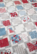 Load image into Gallery viewer, "Iconic 2" geometric quilt by Lella Boutique. Makes a great 4th of July quilt in Old Glory fabric by Lella Boutique for Moda Fabrics. Great scrap quilt using charm packs or a Layer Cake. Download the PDF here!
