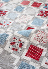 Load image into Gallery viewer, "Iconic 2" geometric quilt by Lella Boutique. Makes a great 4th of July quilt in Old Glory fabric by Lella Boutique for Moda Fabrics. Great scrap quilt using charm packs or a Layer Cake. Download the PDF here!