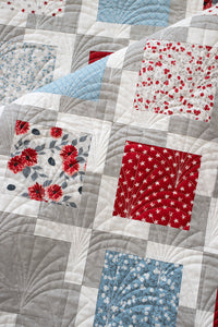 "Iconic 2" geometric quilt by Lella Boutique. Makes a great 4th of July quilt in Old Glory fabric by Lella Boutique for Moda Fabrics. Great scrap quilt using charm packs or a Layer Cake. Download the PDF here!