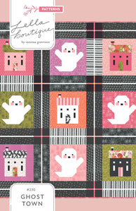 "Ghost Town" quilt by Lella Boutique featuring cute haunted house quilt blocks and friendly ghosts. Fabric is Hey Boo by Lella Boutique for Moda Fabrics (April 2024). 