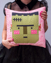 Load image into Gallery viewer, "Frank" Halloween pillow pattern by Lella Boutique. Darling Frankenstein quilt block in pastel Halloween colors. Fabric is Hey Boo by Lella Boutique for Moda Fabrics (April 2024). Download the PDF pattern here!