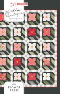 "Flower Press" flower quilt by Lella Boutique. Layer Cake or fat eighth friendly. Fabric is Love Blooms (and Magic Dot) by Lella Boutique for Moda Fabrics.