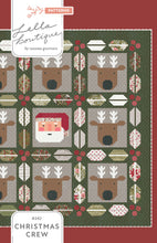 Load image into Gallery viewer, Christmas Crew - a holiday quilt featuring Santa and his reindeer framed in berry and pine sashing. Make it with a Jelly Roll or Layer Cake. Fabric is Berry & Pine by Lella Boutique for Moda Fabrics. Download the PDF here!