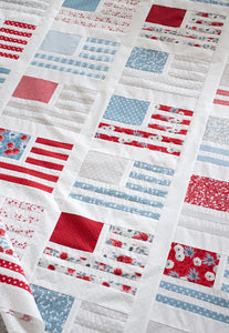 "Miss Americana" American flag quilt by Lella Boutique. Cute 4th of July quilt perfect for summertime in the USA. Fabric is Old Glory by Lella Boutique for Moda Fabrics. Download the PDF here!