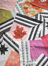 Load image into Gallery viewer, &quot;The Web&quot; modern Halloween quilt in Hey Boo fabric by Lella Boutique for Moda Fabrics. Modern spider web quilt using a Layer Cake and/or the Hey Boo quilt panel.