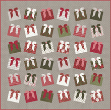 Load image into Gallery viewer, "Wrap It Up" gift quilt design by Vanessa Goertzen of Lella Boutique. Pretty wonky presents in a simple layout. Fat quarter friendly. Fabric is Berry & Pine by Lella Boutique for Moda Fabrics (May 2025). Download the PDF here.
