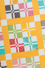 Load image into Gallery viewer, Lickety Split disappearing 4-to-9 patch quilt pattern from the book: Charm School - 18 Quilts from 5" Squares by Vanessa Goertzen of Lella Boutique. Get your autographed copy of the book here! Lots of great charm pack quilts.