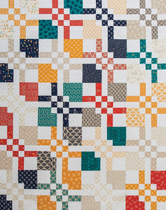Cat's Cradle quilt from the book: Charm School - 18 Quilts from 5" Squares by Vanessa Goertzen of Lella Boutique. Get your autographed copy of the book here! Lots of great charm pack quilts.