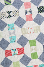 Load image into Gallery viewer, Somersault modern boy quilt from the book: Charm School - 18 Quilts from 5&quot; Squares by Vanessa Goertzen of Lella Boutique. Get your autographed copy of the book here! Lots of great charm pack quilts. Fabric is Daysail by Bonnie &amp; Camille for Moda Fabrics.