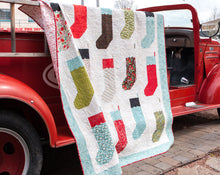 Load image into Gallery viewer, By the Chimney Christmas stocking quilt by Lella Boutique. Fabric is Juniper Berry by BasicGrey for Moda Fabrics.