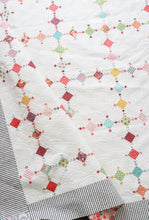 Load image into Gallery viewer, Diamond Dust quilt by Lella Boutique. Make it with charm packs, mini charm packs, or scraps. Fabric is Lollipop Garden by Lella Boutique for Moda Fabrics