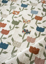 Load image into Gallery viewer, Flourish climbing roses quilt pattern by Lella Boutique. Make these beautiful flower quilt blocks with fat quarters or fat eighths. Fabric is Flower Pot by Lella Boutique for Moda Fabrics.