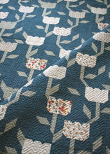 Load image into Gallery viewer, Flourish climbing roses quilt pattern by Lella Boutique. Make these beautiful flower quilt blocks with fat quarters or fat eighths. Fabric is Flower Pot by Lella Boutique for Moda Fabrics.