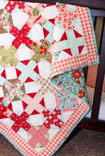 Load image into Gallery viewer, Hot Cross Buns plus sign quilt by Vanessa Goertzen of Lella Boutique. Make it with a Jelly Roll or Layer Cake. Fabric is Bliss by Bonnie &amp; Camille for Moda Fabrics.