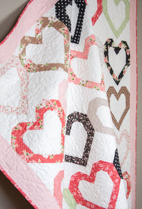 Open Heart quilt by Vanessa Goertzen of Lella Boutique. Make it with fat quarters or fat eighths. Fabric is Bloomington by Lella Boutique for Moda Fabrics.