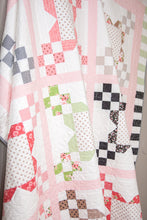 Load image into Gallery viewer, Bloomington jelly roll flower quilt by Lella Boutique. Fabric is Olive's Flower Market by Lella Boutique for Moda Fabrics.