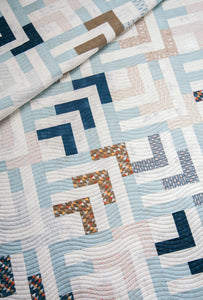 Beachcomber log cabin quilt by Vanessa Goertzen of Lella Boutique. Make it with a jelly roll or layer cake. Fabric is Persimmon by BasicGrey for Moda Fabrics. Great boy quilt!