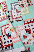 Load image into Gallery viewer, In the Mix scrappy log cabin quilt from the book: Jelly Filled - 18 Quilts from 2-1/2" Strips by Vanessa Goertzen of Lella Boutique. Get your autographed copy of the book here! Lots of great jelly roll strip quilts. Fabric is Bonnie & Camille for Moda Fabrics.