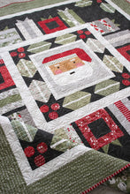 Load image into Gallery viewer, Jolly Holiday Christmas quilt by Vanessa Goertzen of Lella Boutique. Christmas medallion quilt design featuring traditionally piece Santa, holly berries and leaves, and scrappy gifts. Jelly Roll friendly! Fabric is Christmas Eve by Lella Boutique for Moda Fabrics arriving May 2023.