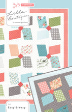 Load image into Gallery viewer, Easy Breezy large pinwheel quilt. Layer Cake friendly. Fabric is Nest by Lella Boutique for Moda Fabrics.