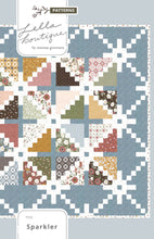 Load image into Gallery viewer, Sparkler star quilt by Lella Boutique. Layer Cake quilt. Fabric is Folktale by Lella Boutique for Moda Fabrics. Download the PDF here!