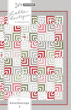 Load image into Gallery viewer, Kaleidoscope 2 hypnotic quilt design. Honeybun quilt (made with 1.5" strips). Fabric is Christmas Morning by Lella Bourique for Moda.