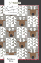 Load image into Gallery viewer, Reindeer Xing quilt by Lella Boutique. Make it with fat quarters or a layer cake. Fabric is Christmas Eve by Lella Boutique for Moda Fabrics.