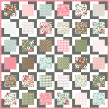 Load image into Gallery viewer, "Iconic" layer cake quilt by Lella Boutique. Simple, modern beginner quilt that is quick to make. Fabric is Lovestruck by Lella Boutique for Moda Fabrics. Download the PDF here.