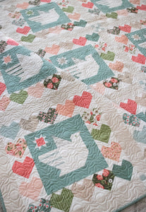 Lovey Dovey spring quilt pattern. Dove quilt. Heart quilt. Fat quarter quilt. Fabric is Love Note fabric collection by Lella Boutique. Download the PDF here.
