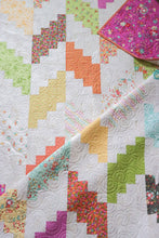 Load image into Gallery viewer, Marbled Cheesecake herringbone quilt from the book:L Jelly Filled - 18 Quilts from 2-1/2" Strips by Vanessa Goertzen of Lella Boutique. Get your autographed copy of the book here! Lots of great jelly roll strip quilts. Fabric is Sunnyside by Corey Yoder of Coriander Quilts for Moda Fabrics.