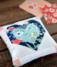 Load image into Gallery viewer, Mini Open Heart pin cushion. Cutest little heart pin cushion made from mini charm packs. Fabric is Lollipop Garden by Lella Boutique for Moda Fabrics.