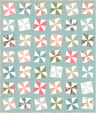 Load image into Gallery viewer, Shuffle pinwheel quilt pattern by Lella Boutique. Make it with charm packs. Fabric is Love Note by Lella Boutique for Moda Fabrics.