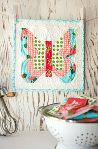 Social Butterfly mini quilt by Vanessa Goertzen of Lella Boutique. Fabric is Gooseberry by Lella Boutique for Moda Fabrics.