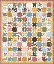 Load image into Gallery viewer, Starstruck 2 bursting star quilt featuring sawtooth star blocks. Layer Cake quilt or fat quarter quilt. Fabric is Folktale by Lella Boutique for Moda. Download the PDF here!