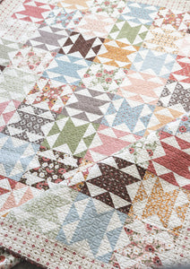 Chatterbox geometric quilt by Vanessa Goertzen of Lella Boutique. Jelly Roll or Layer Cake friendly. Fabric is Folktale by Lella Boutique for Moda Fabrics.