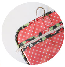 Load image into Gallery viewer, "Kiss & Makeup" hanging travel bag pattern by Lella Boutique. Great sewing pattern for a toiletry bag. Fabric is Bloomington by Lella Boutique for Moda Fabrics.