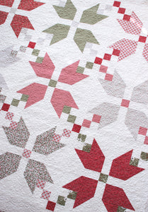 "Figgy Pudding" simple Christmas star quilt by Lella Boutique. Fat Quarter quilt. Fabric is Christmas Morning by Lella Boutique for Moda.
