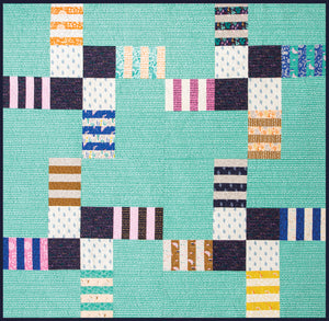 Hand Mixer quilt from the book: Jelly Filled - 18 Quilts from 2-1/2" Strips by Vanessa Goertzen of Lella Boutique. Get your autographed copy of the book here! Lots of great jelly roll strip quilts. Fabric is Yucatan by Annie Brady for Moda Fabrics.