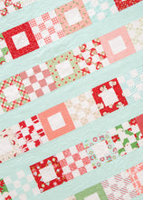 Load image into Gallery viewer, Petit Fours scrap quilt from the book: Jelly Filled - 18 Quilts from 2-1/2&quot; Strips by Vanessa Goertzen of Lella Boutique. Get your autographed copy of the book here! Lots of great jelly roll strip quilts. Fabric is Swell Christmas by Urban Chiks + Vintage Holiday by Bonnie &amp; Camille for Moda Fabrics.