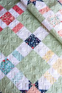 Pretty Please charm pack quilt PDF pattern by Lella Boutique. Easy beginner quilt using Garden Variety fabric by Lella Boutique for Moda Fabrics.