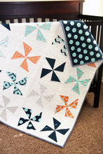Load image into Gallery viewer, Shuffle pinwheel quilt pattern by Lella Boutique. Make it with charm packs. Fabric is Mixologie by Studio M for Moda Fabrics.