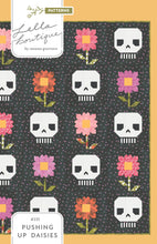 Load image into Gallery viewer, &quot;Pushing Up Daisies&quot; skull quilt by Lella Boutique. Cute mix of daisies and skeletons in this Halloween quilt. Fabric is Hey Boo by Lella Boutique for Moda Fabrics (April 2024). 