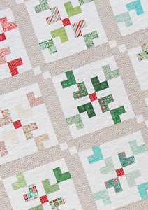 Snowfall Quilt Model in Evergreen Fabric