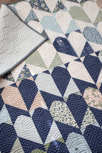 "Achy Breaky" heart quilt in True Love fabric by Lella Boutique for Moda Fabrics. Fat quarter friendly and bringing all the drama with these scrappy heart blocks. Download the PDF here