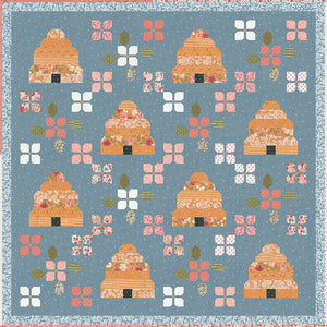 Bloom & Buzz beehive and flower quilt by Lella Boutique. Jelly Roll friendly Fabric is Wild Honey by Lella Boutique for Moda Fabrics (Nov 2025).